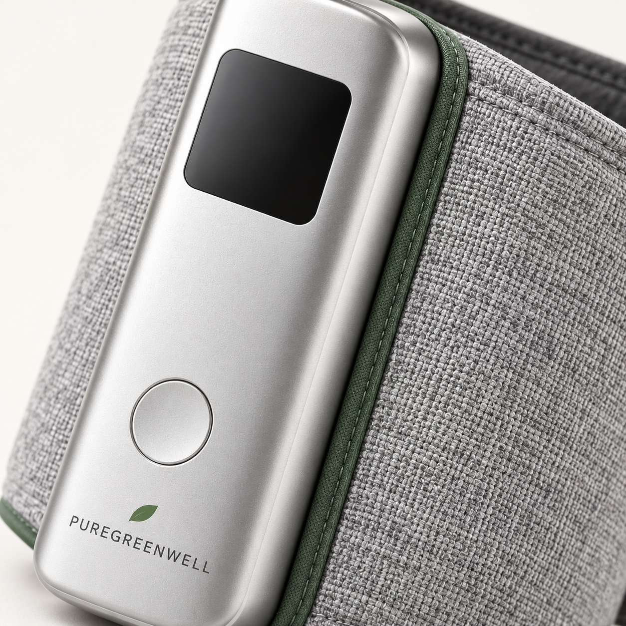 Close-up of the silver PureGreenWell Kora monitor and gray woven cuff